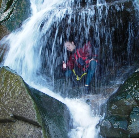 greg under waterfall